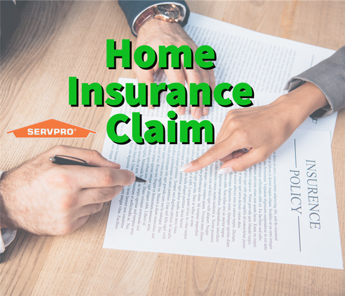 Two people filing a home insurance claim