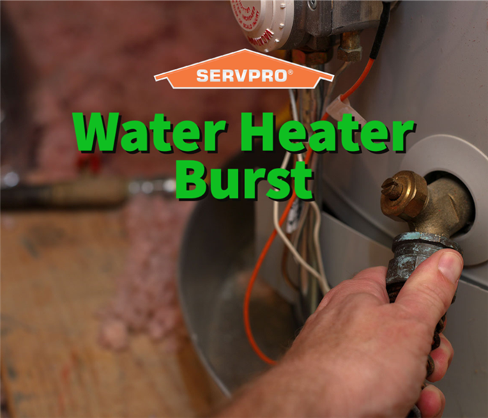 A water heater burst being repaired by a SERVPRO professional.